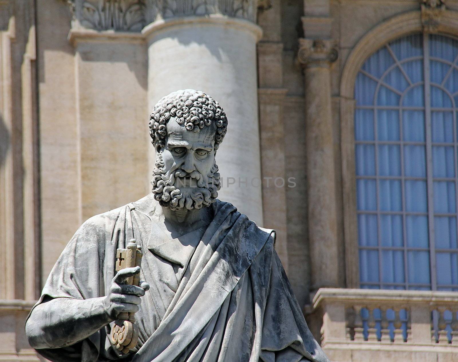 Statue of St. Peter outside St. Peters Basilica, Vatican, Rome, Italy. Closeup. Holding the keys of Heaven