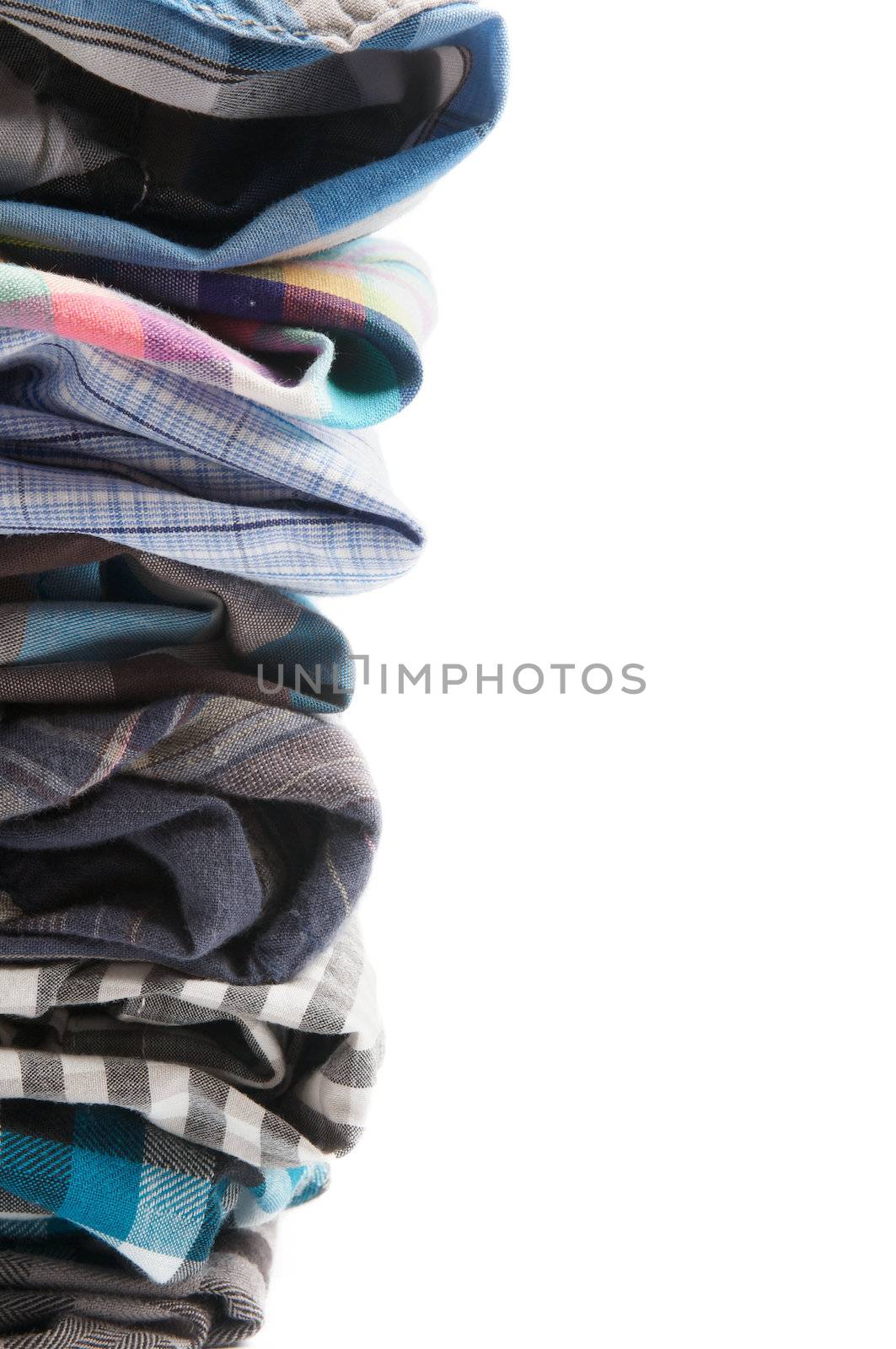 Frame of Various Plaid Men's Shirts close up isolated on white background