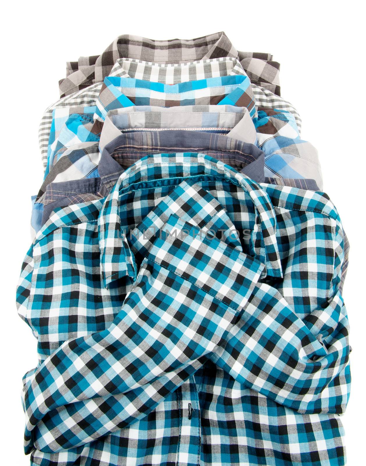 Stack of Plaid Long Sleeved Men's Shirts  by zhekos