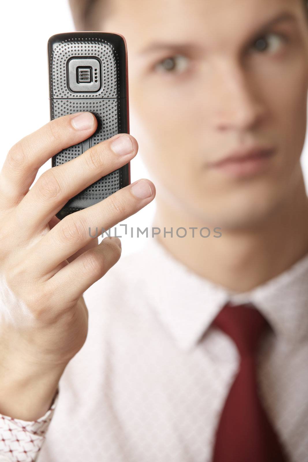 Businessman using cellular phone as GPS and internet device
