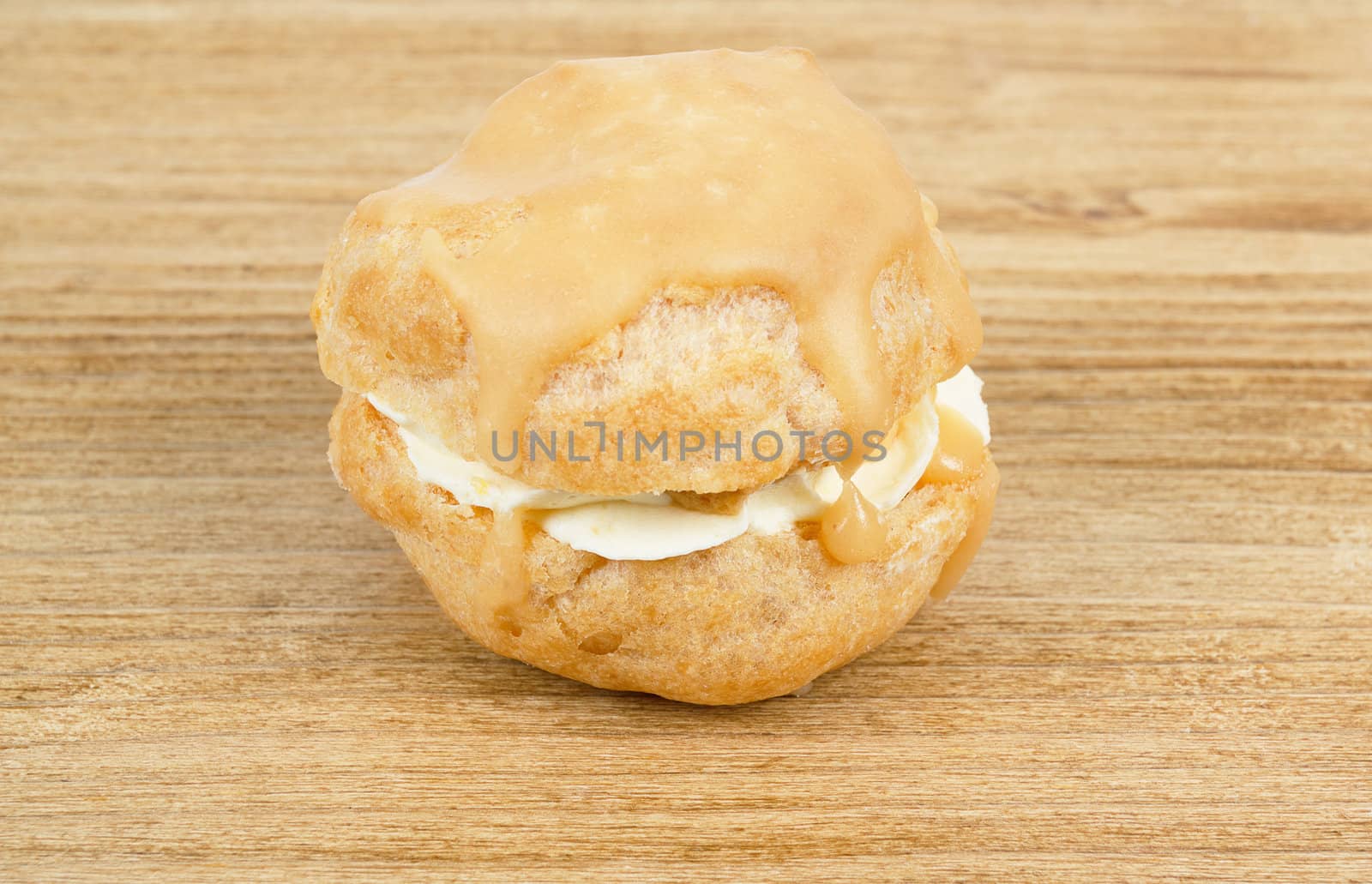 homemade very sweet candy cake on wooden background