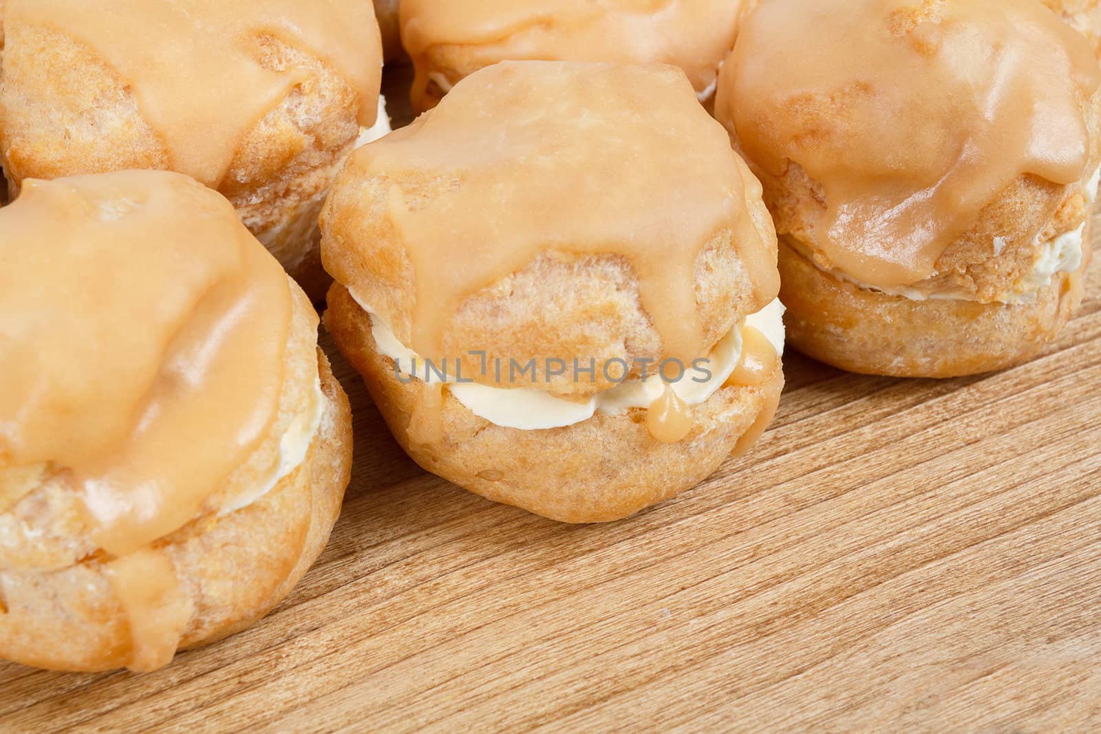 homemade very sweet candy cakes on wooden background