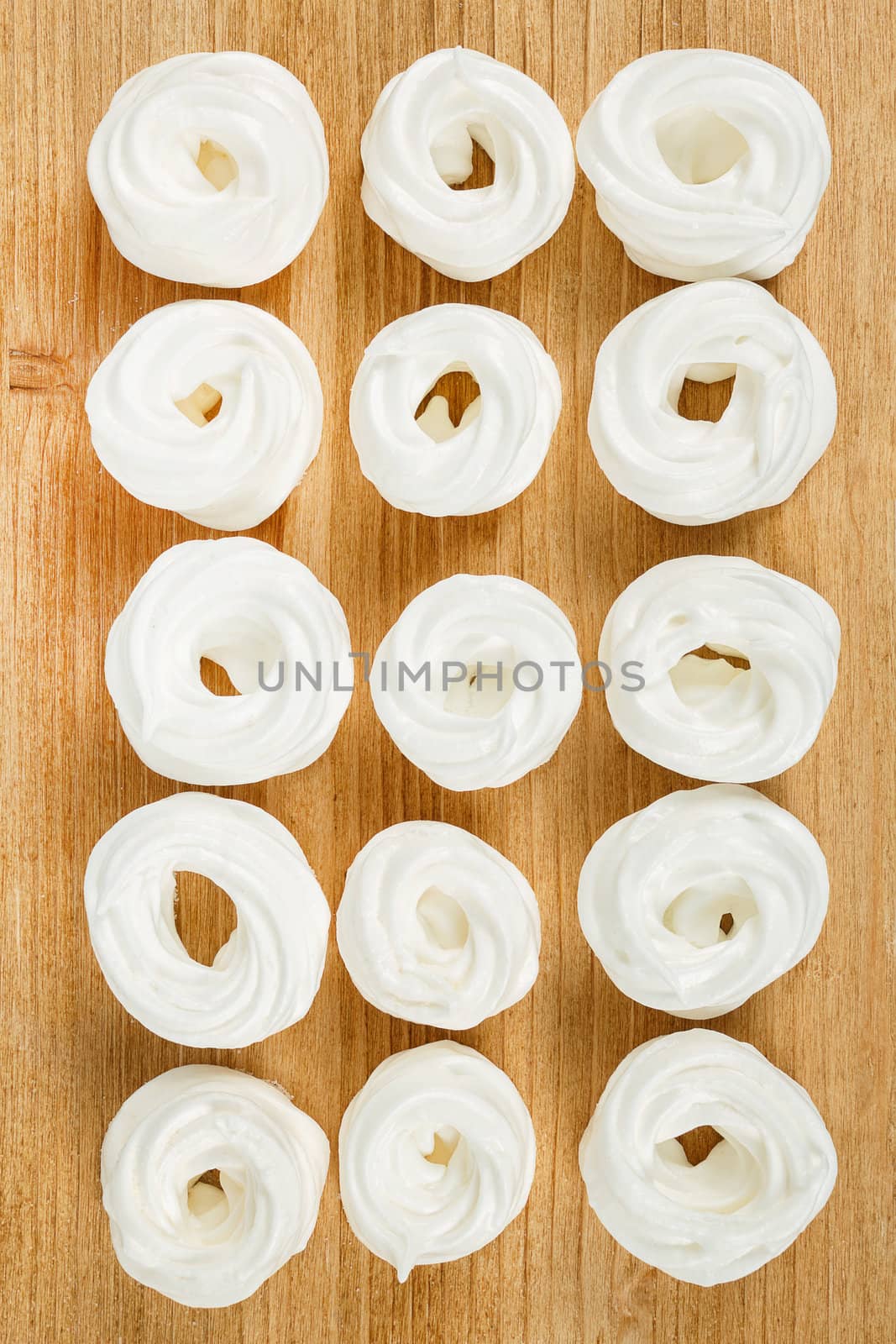 homemade white very sweet baked, candy on wooden background