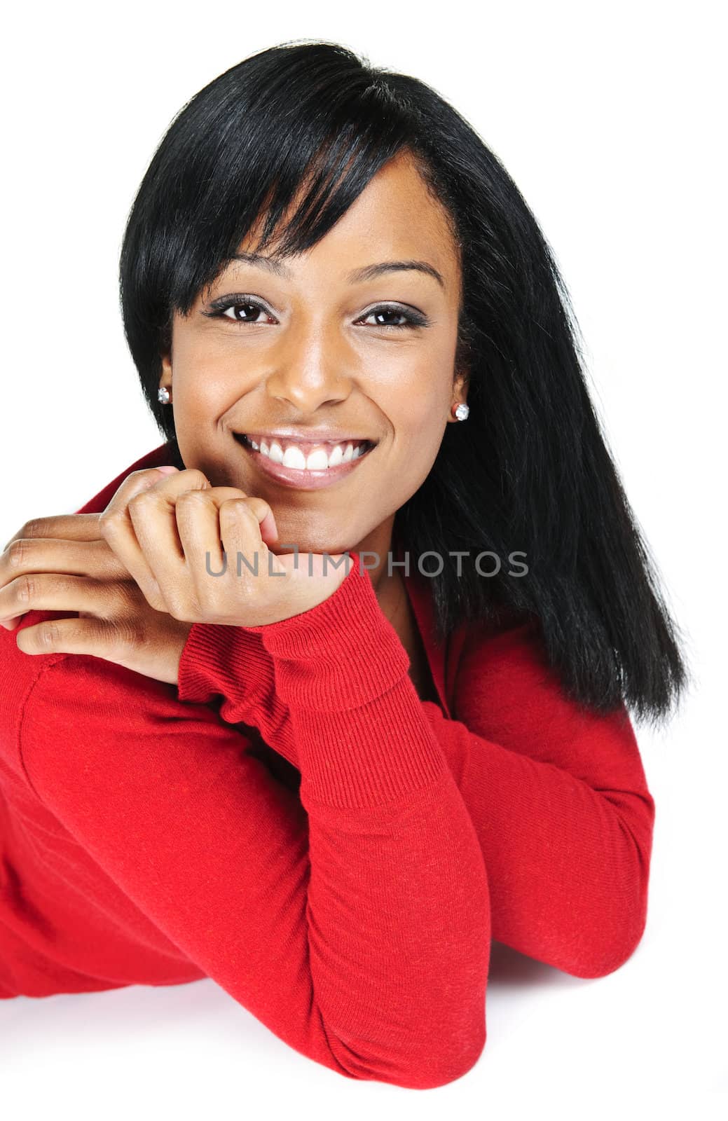 Portrait of young black woman smiling by elenathewise