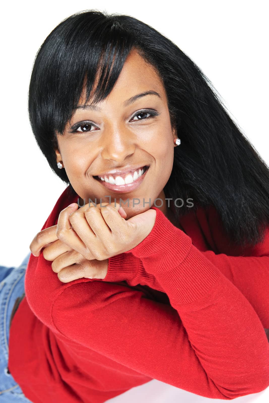 Portrait of black woman smiling laying isolated on white background