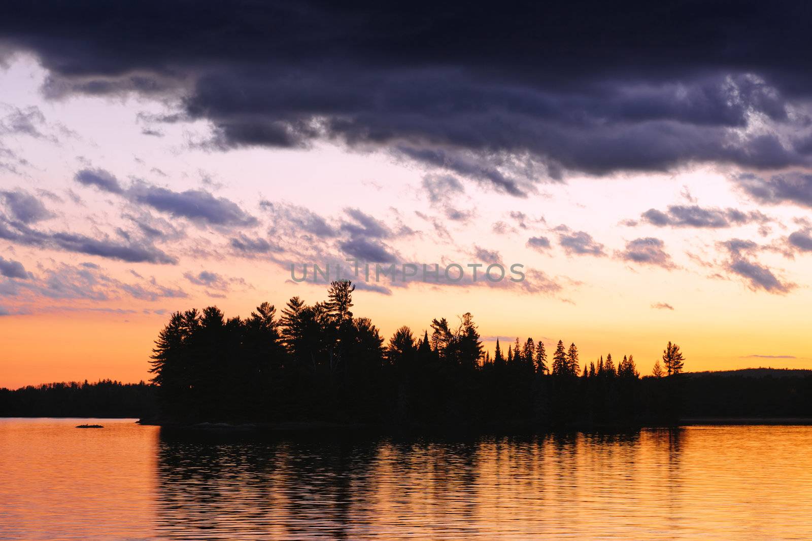 Dramatic sunset at Lake of Two Rivers in Algonquin Park, Ontario, Canada