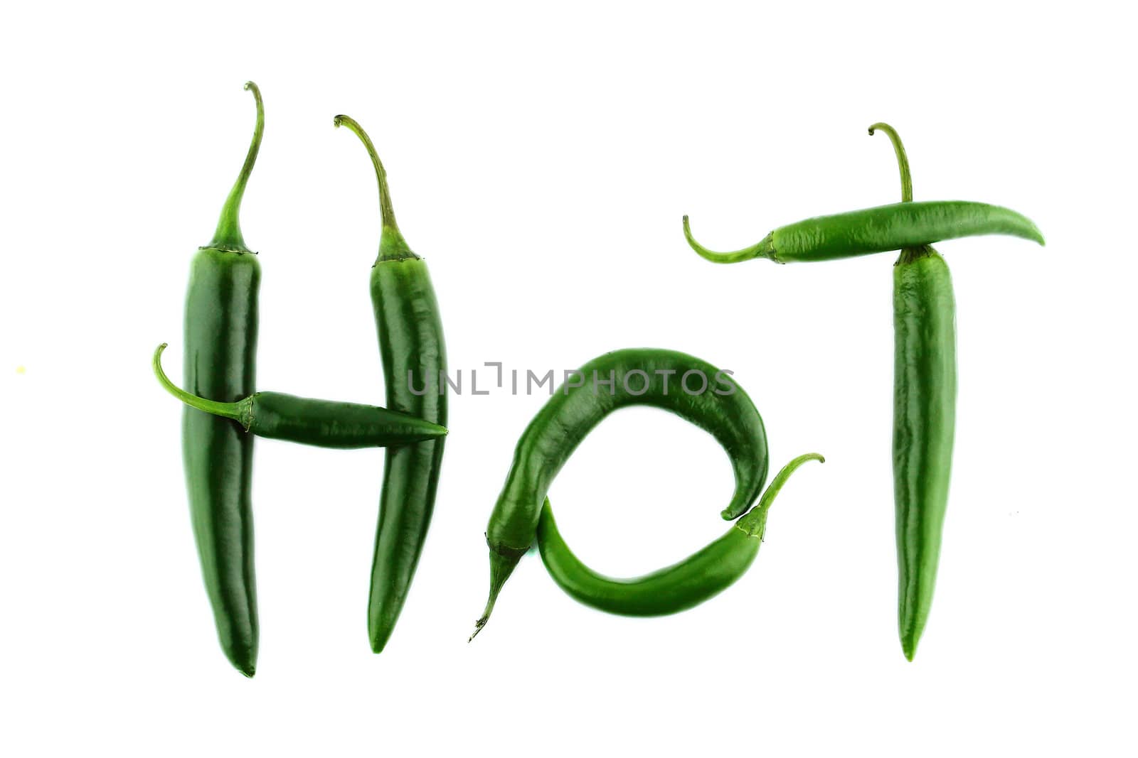 Hot word made from Green hot chili pepper on white background with a clipping path