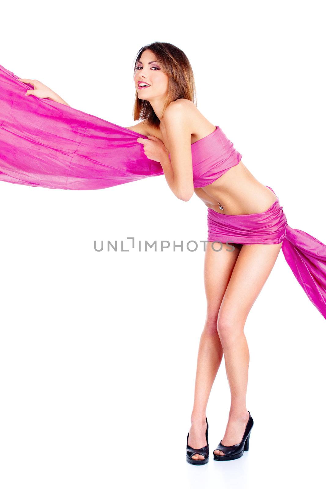 Young woman covered with pink material, isolate on white background
