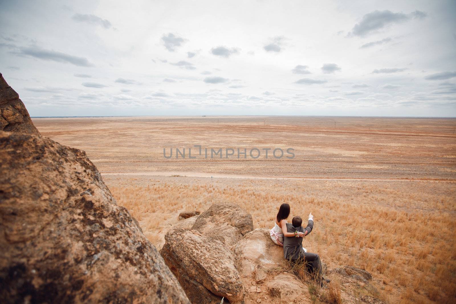 bride and groom in the mountains