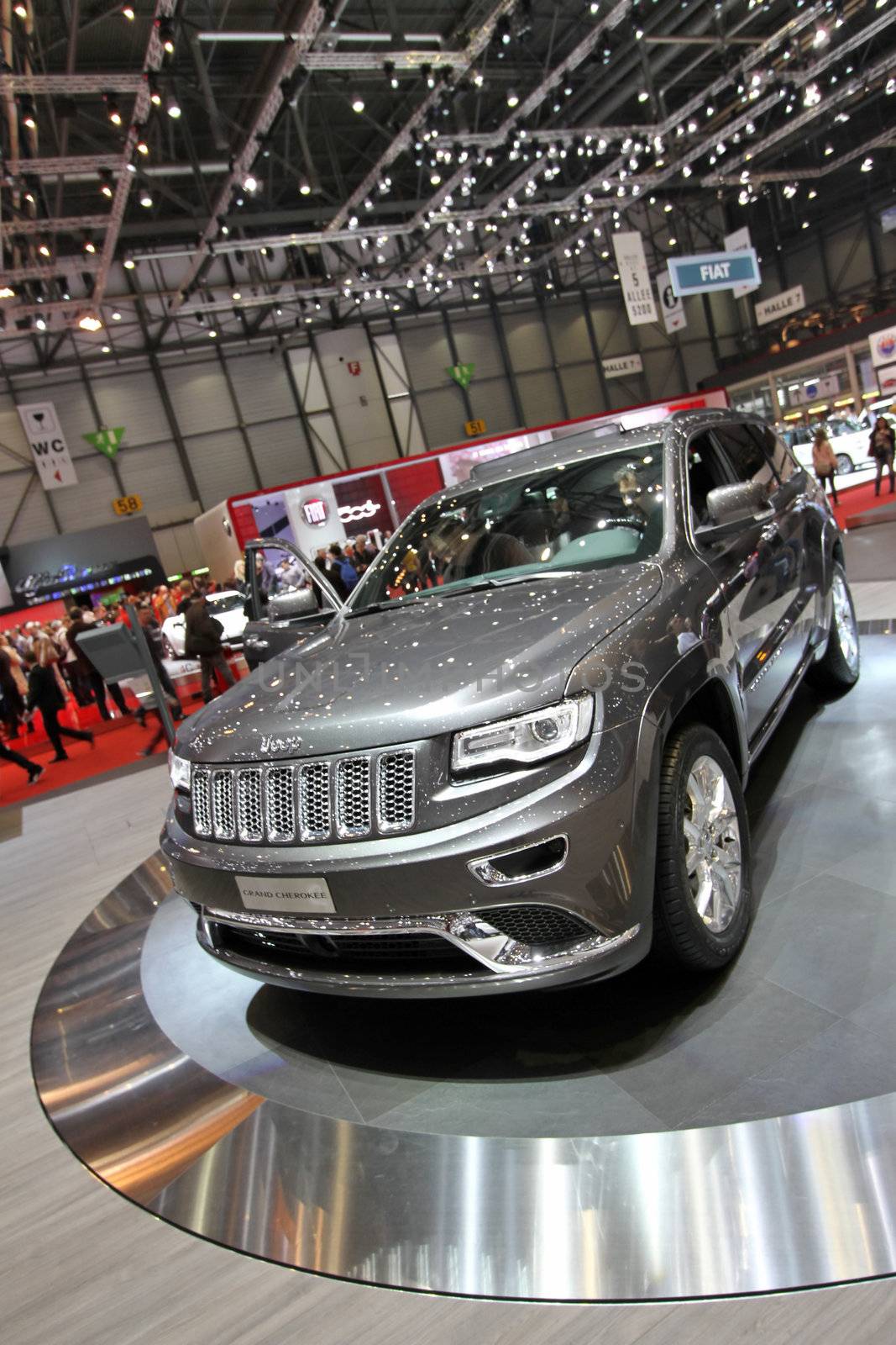 GENEVA - MARCH 8 : grey Jeep Grand Cherokee on display at the 83st International Motor Show Palexpo - Geneva on March 8, 2013 in Geneva, Switzerland.