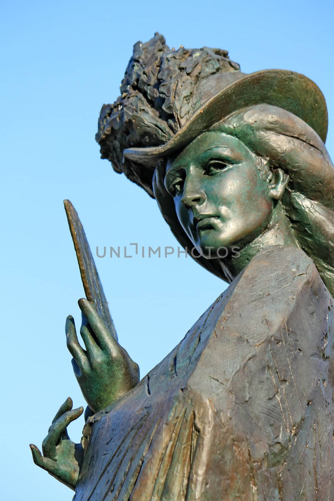 GENEVA - FEBRUARY 28 : close up of the face of Elisabeth of Bavaria statue (Sissi) - Geneva on February 28, 2013 in Geneva, Switzerland. Sculptor Philipp Jackson created this statue in 1998 to commemorate the Empress murder in 1898 in Geneva.