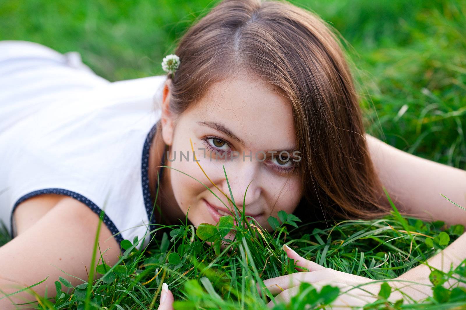 portrait of a beautiful young woman with flower  outdoor