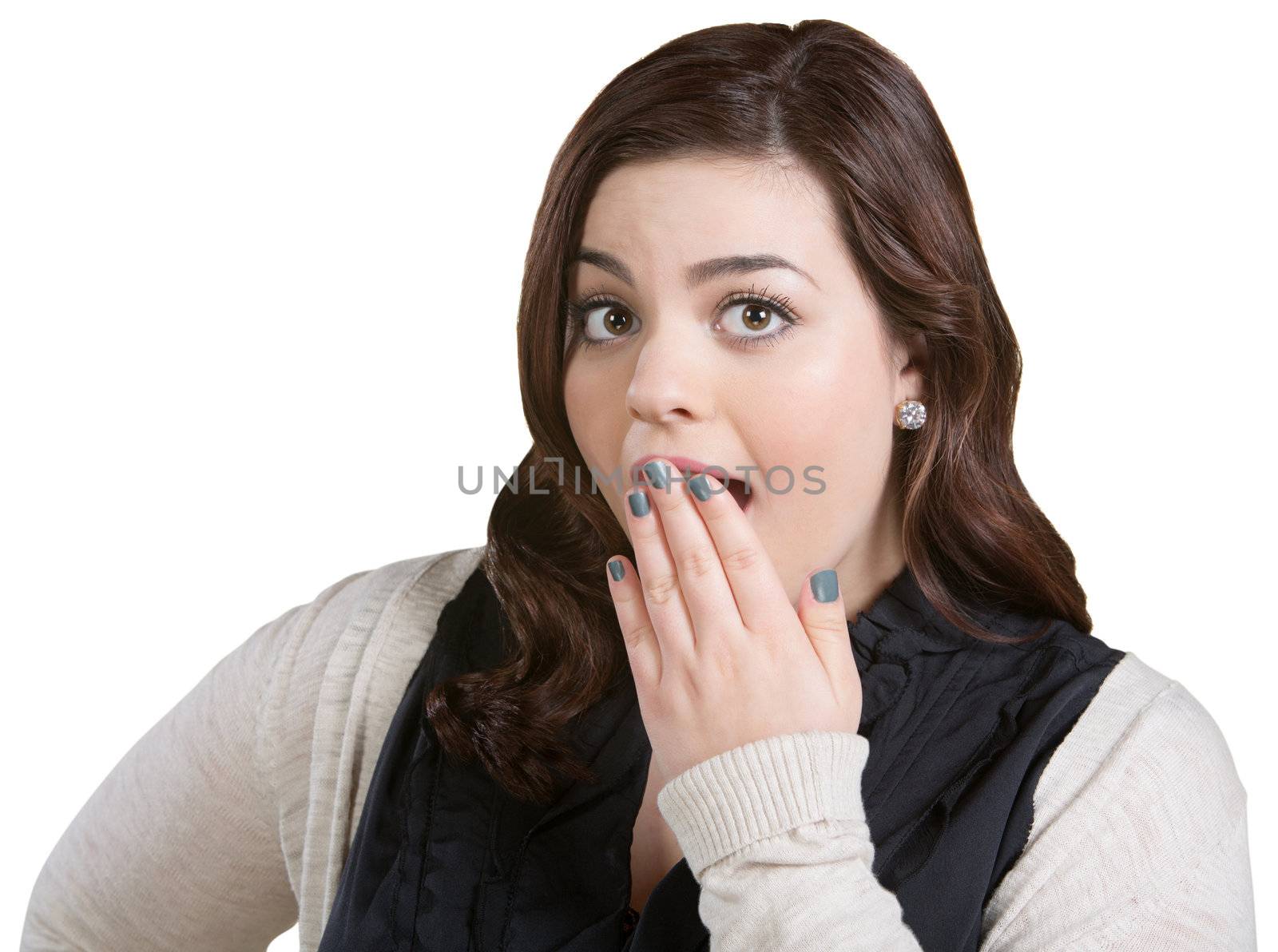 Surprised young female on white with hand over mouth