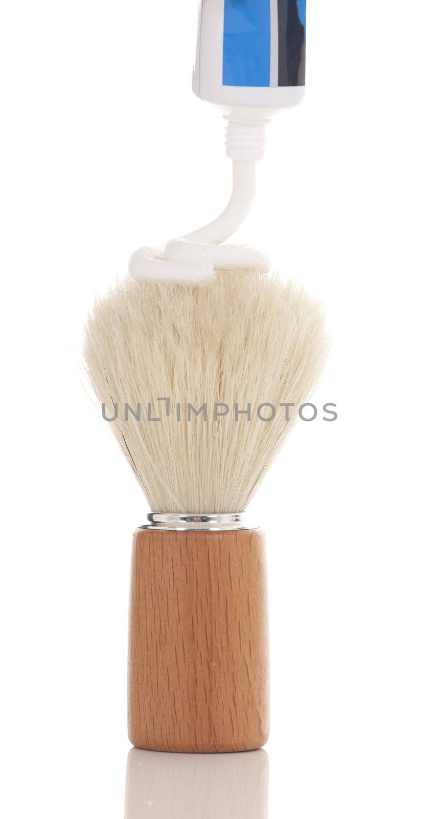 Retro badger shaving brush with a dollop of shaving cream