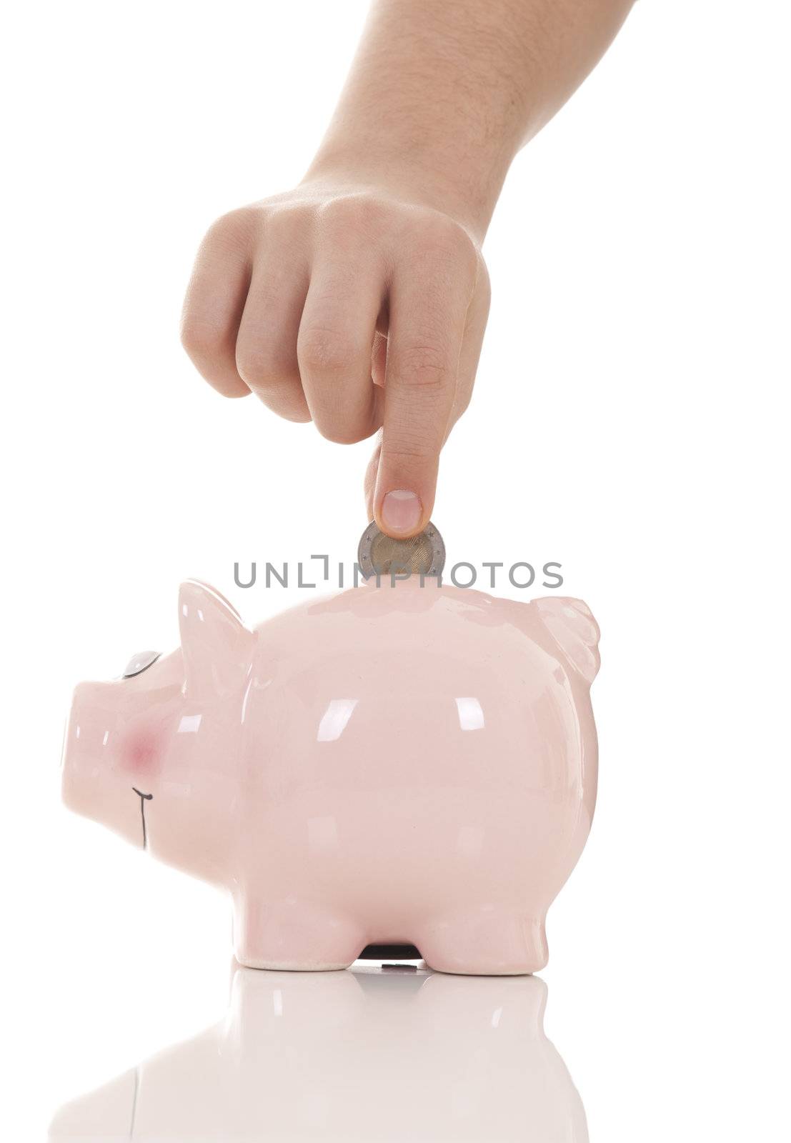 Savings - Piggy bank and hand with coin  by senkaya