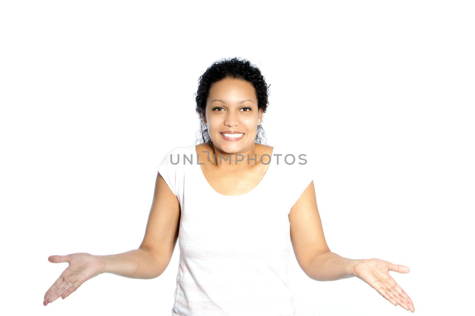 Beautiful young African American woman shrugging her shoulders to indicate that she does not know the answer isolated on white