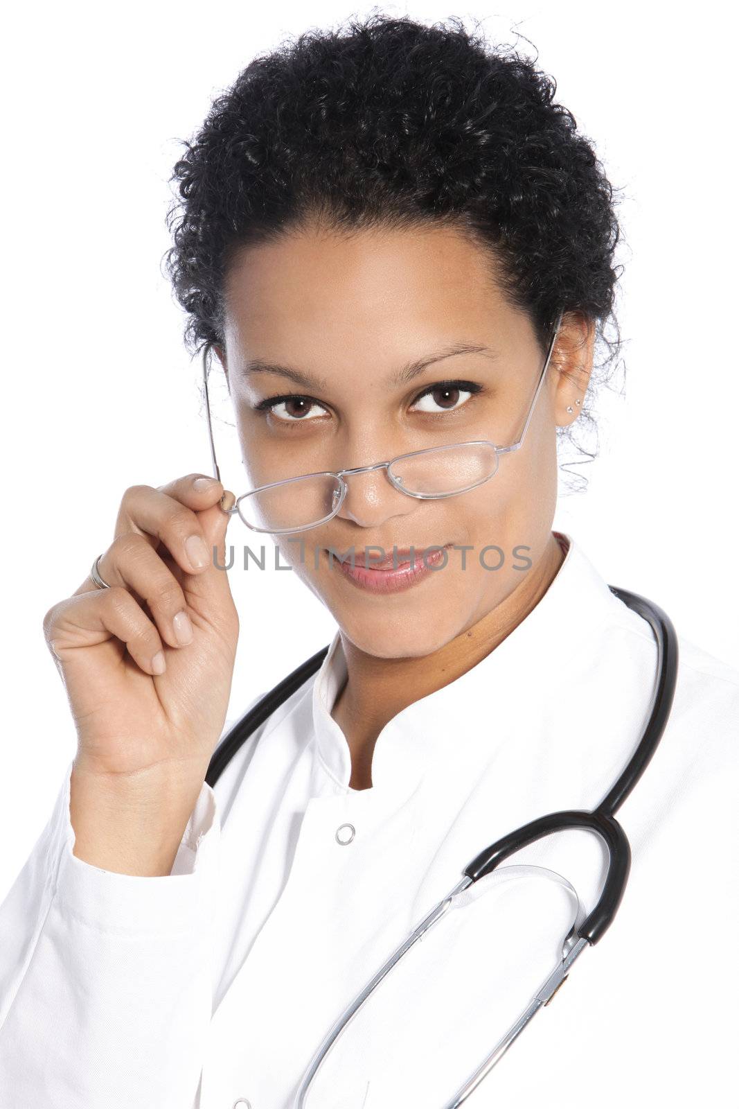 Studio portrait on white of the head and shoulders of a beautiful African American woman doctor
