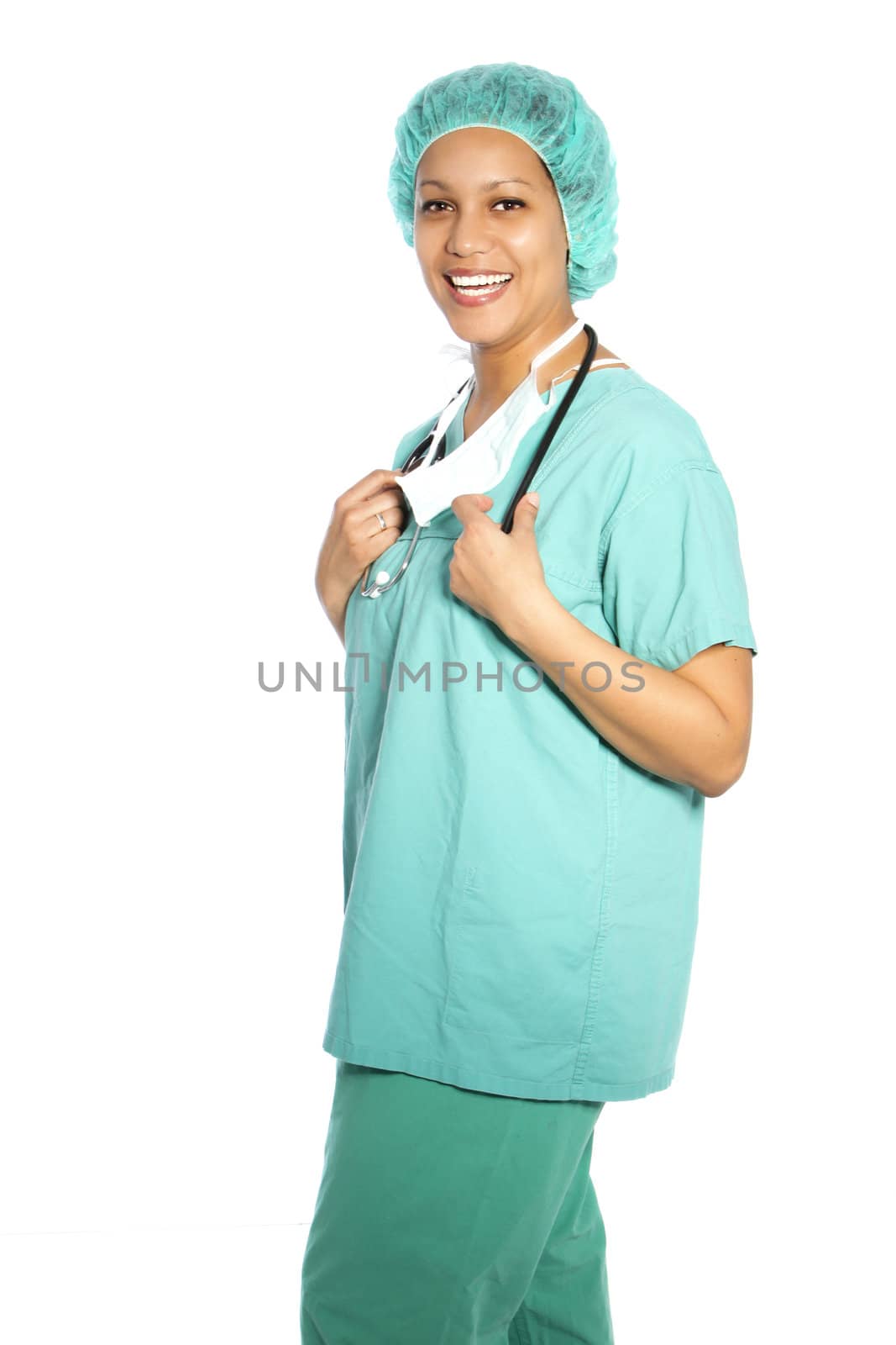 Happy female African American theatre nurse, surgeon or doctor in scrubs, three quarter portrait isolated on white