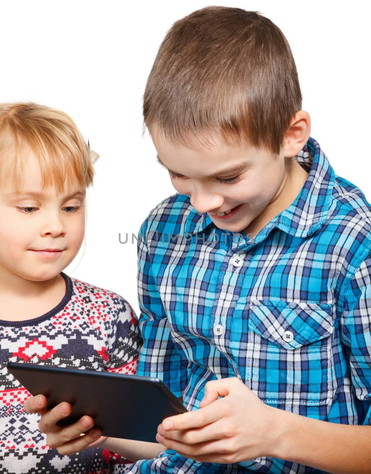 Children playing with a tablet computer by naumoid