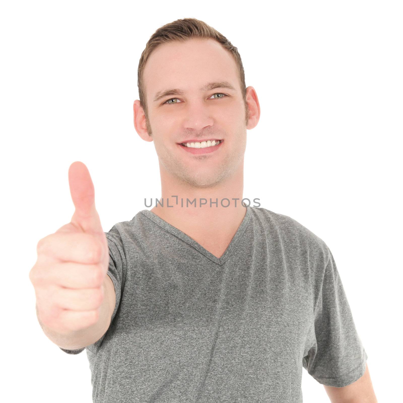 Handsome smiling man showing thumb up isolated on white
