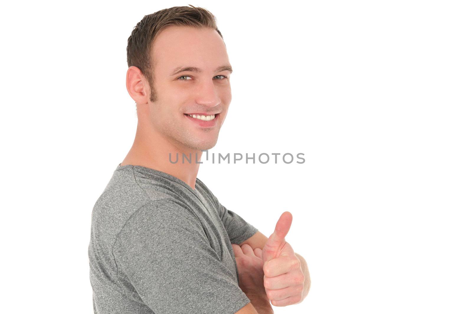 Handsome positive man showing thumb up isolated on white