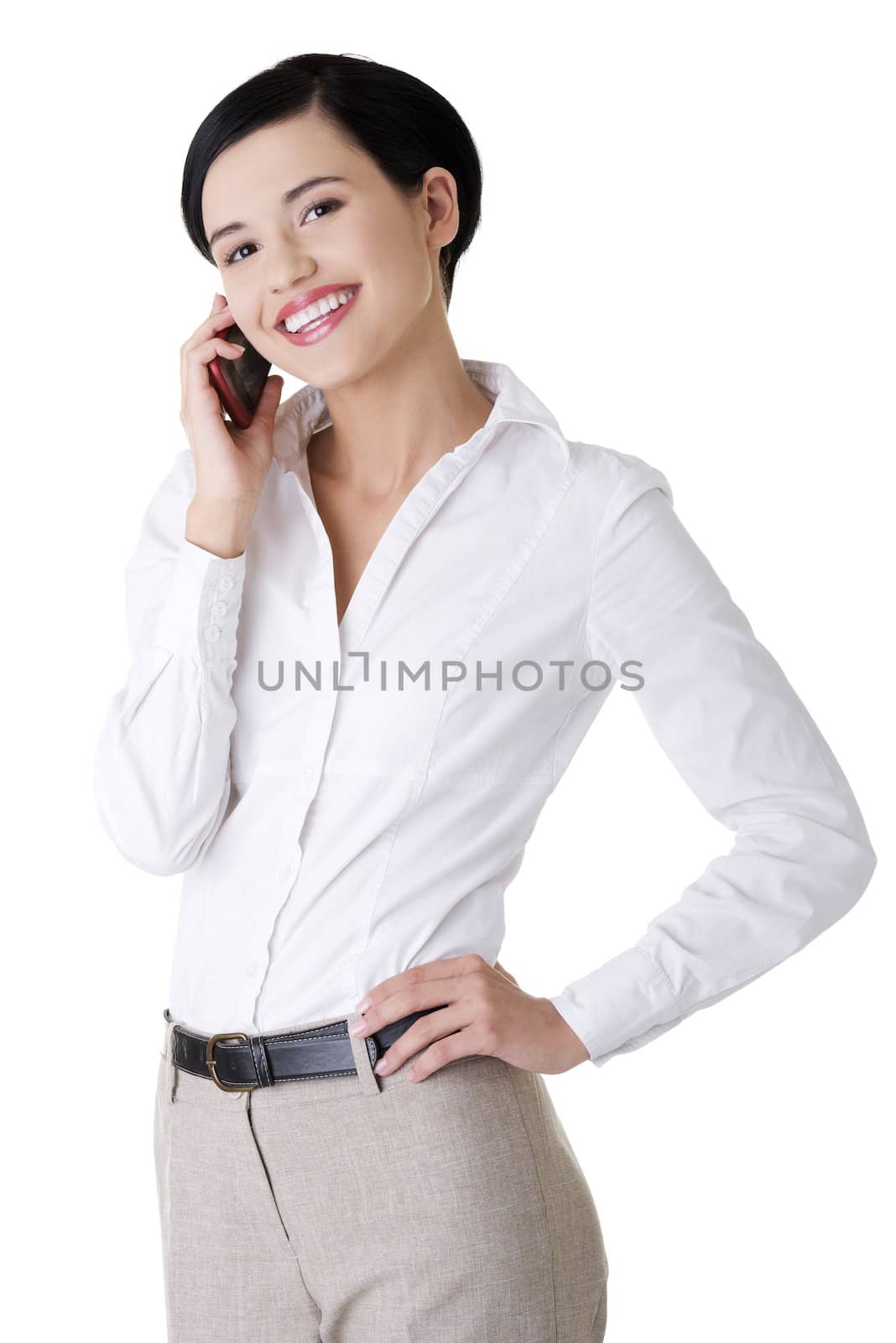 Attractive businesswoman with mobile phone. Isolated on white background