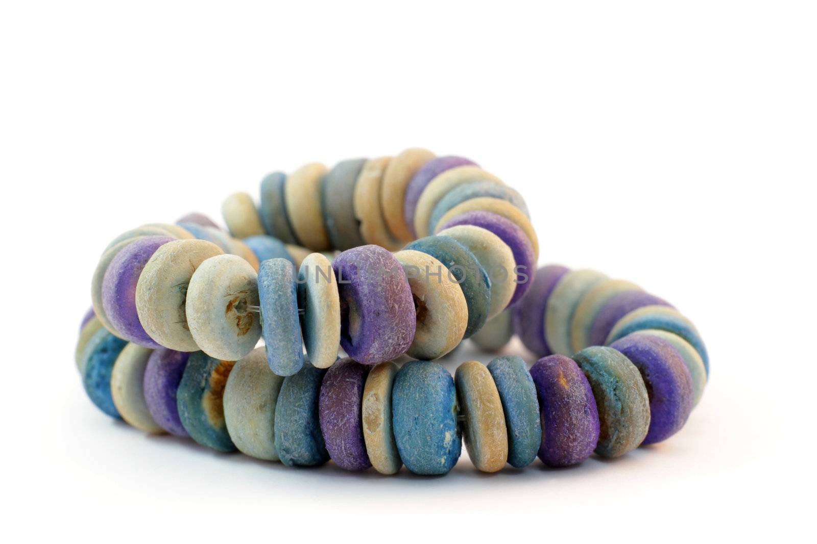 Bracelet made of natural stones on white background