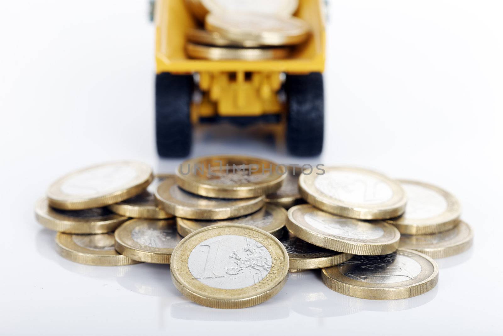 euro money coins and truck on white background 