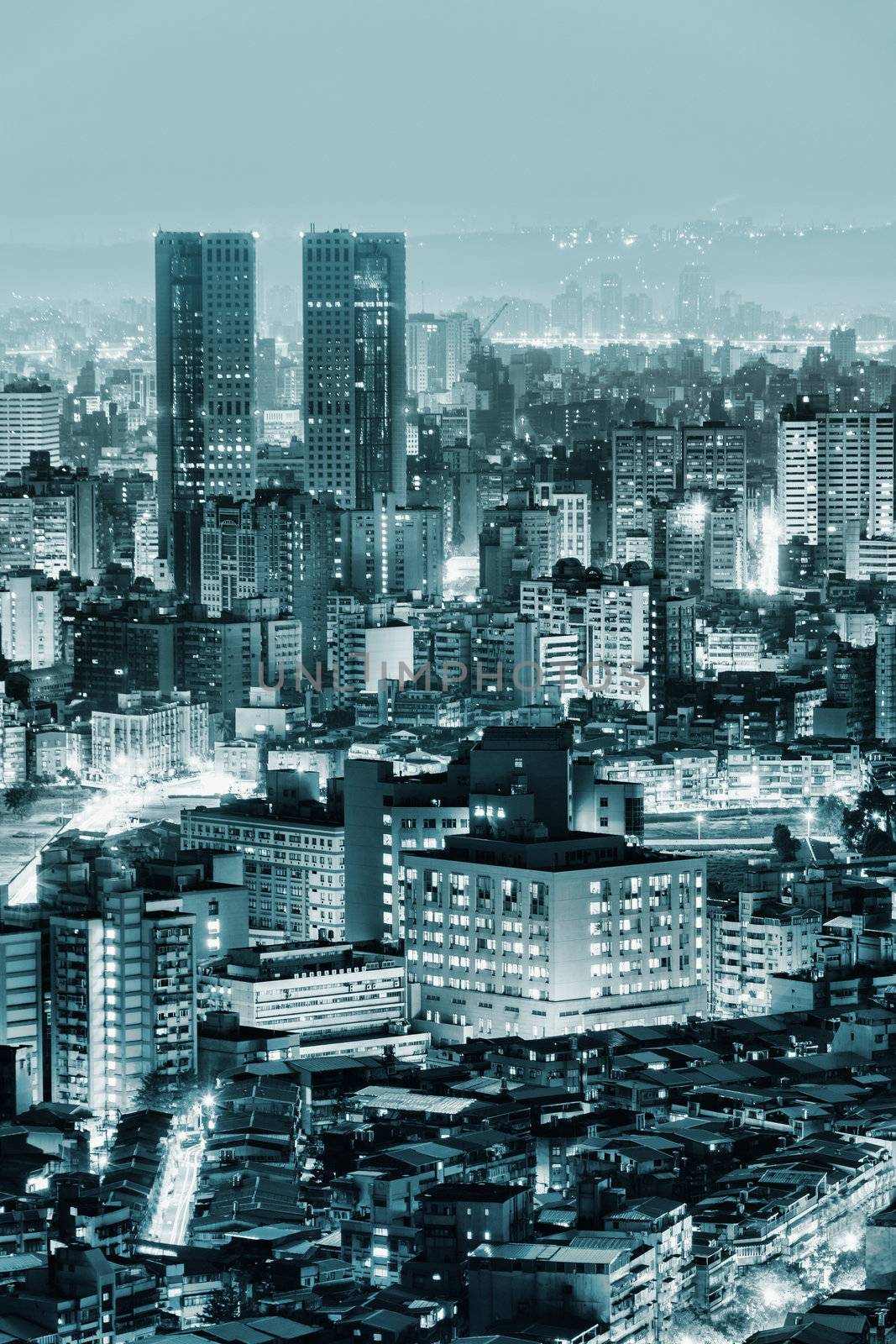 Urban scenery with skyscrapers and apartments in night, Taipei, Taiwan.