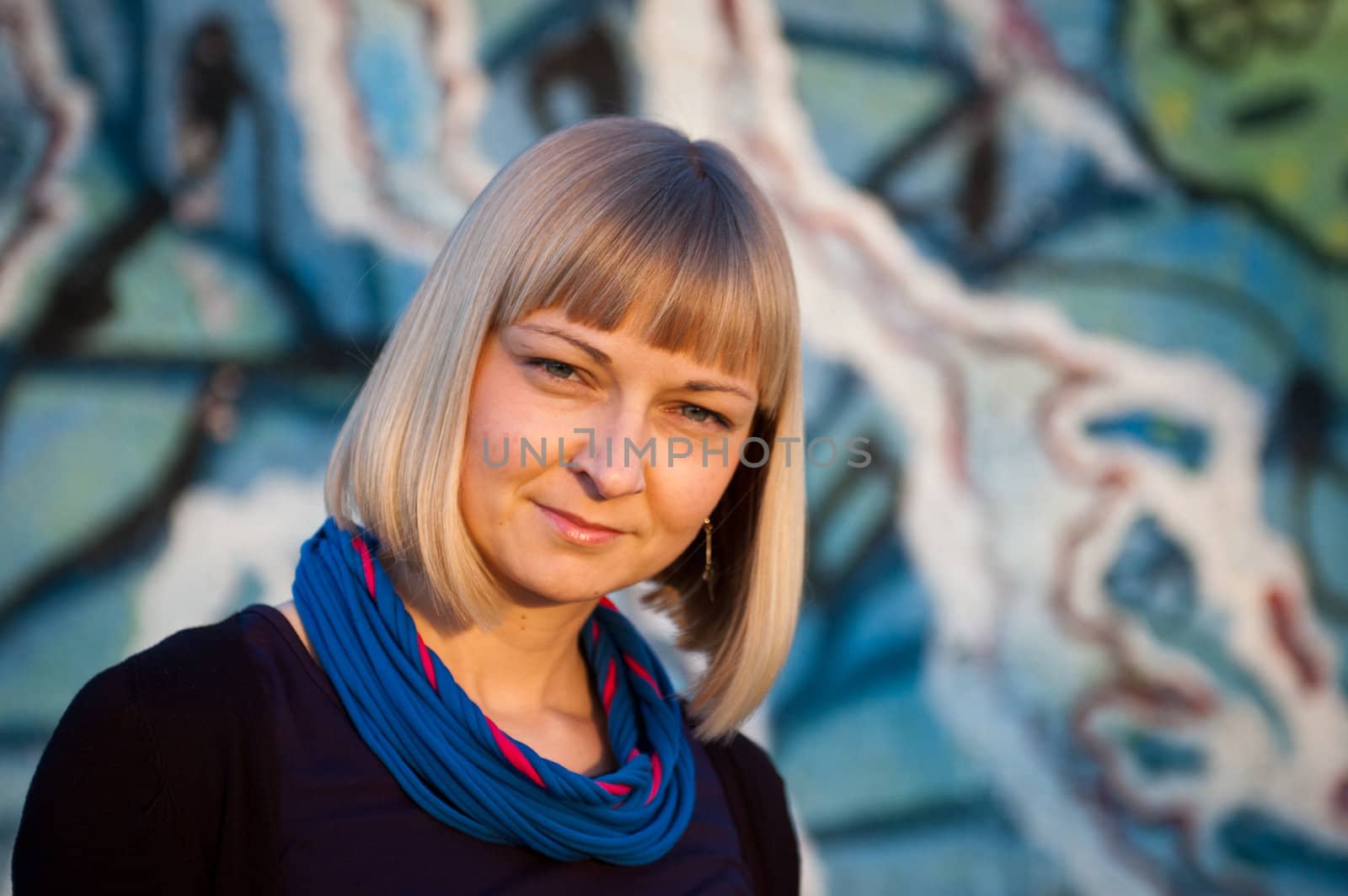 Portrait of a young woman in a sunny day