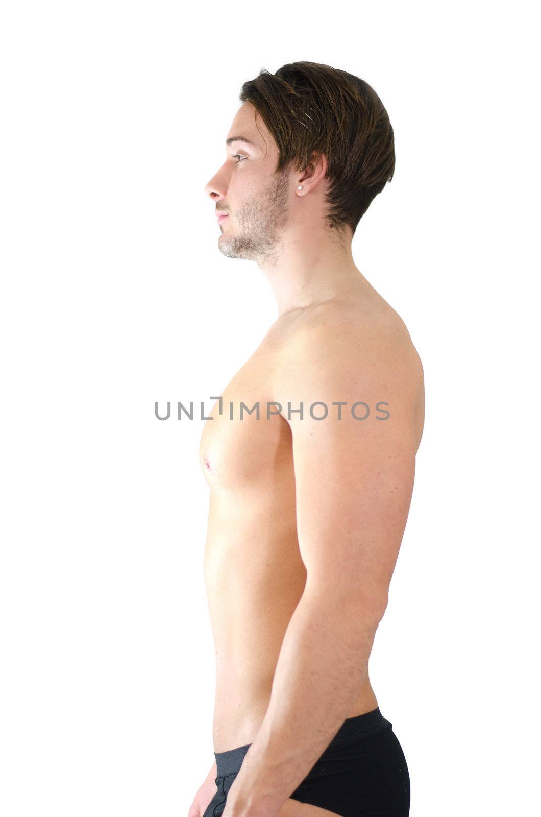 Side or profile view of shirtless young man standing with proper posture or position