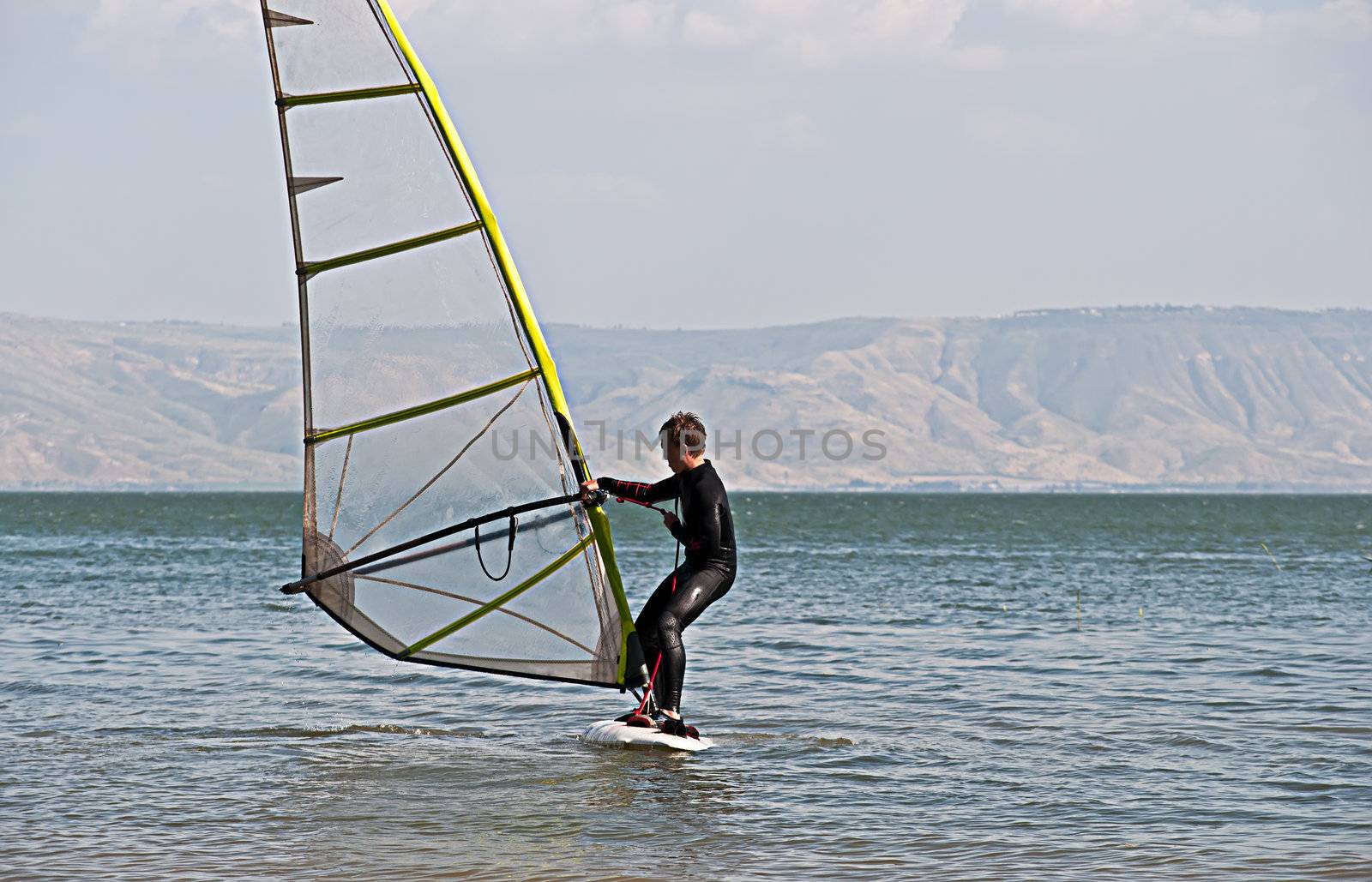 Windsurfing on Lake Kinneret. Spring. Israel.