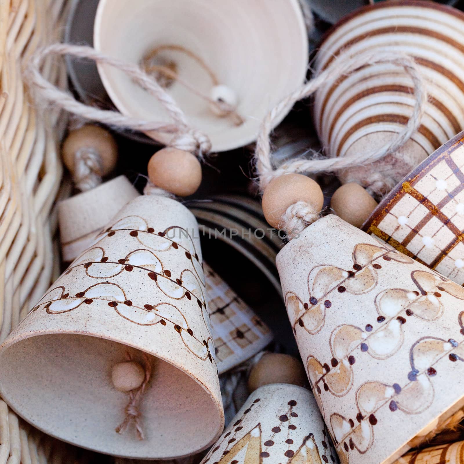ceramic bells  in a basket at the fair