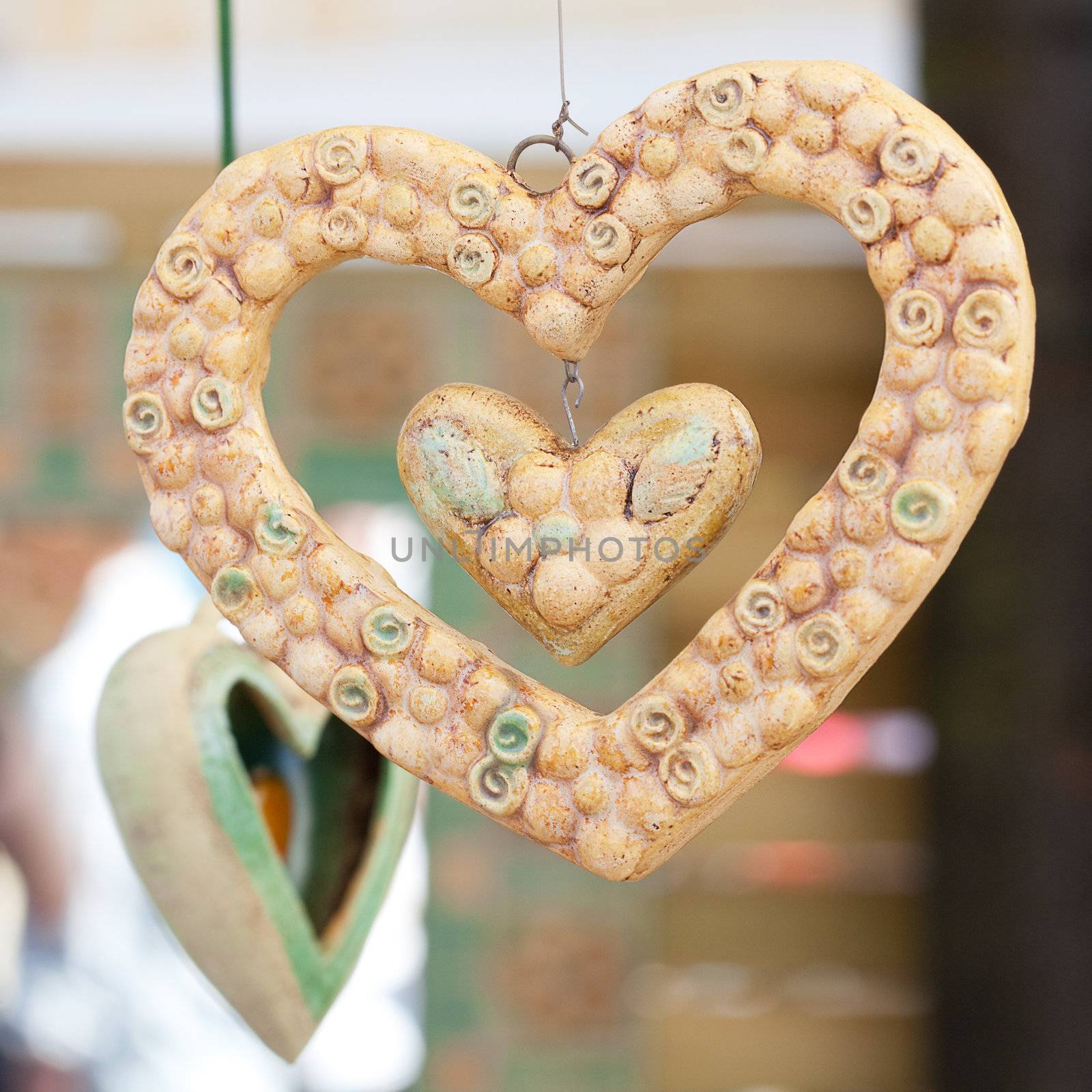 ceramic heart at the fair by jannyjus