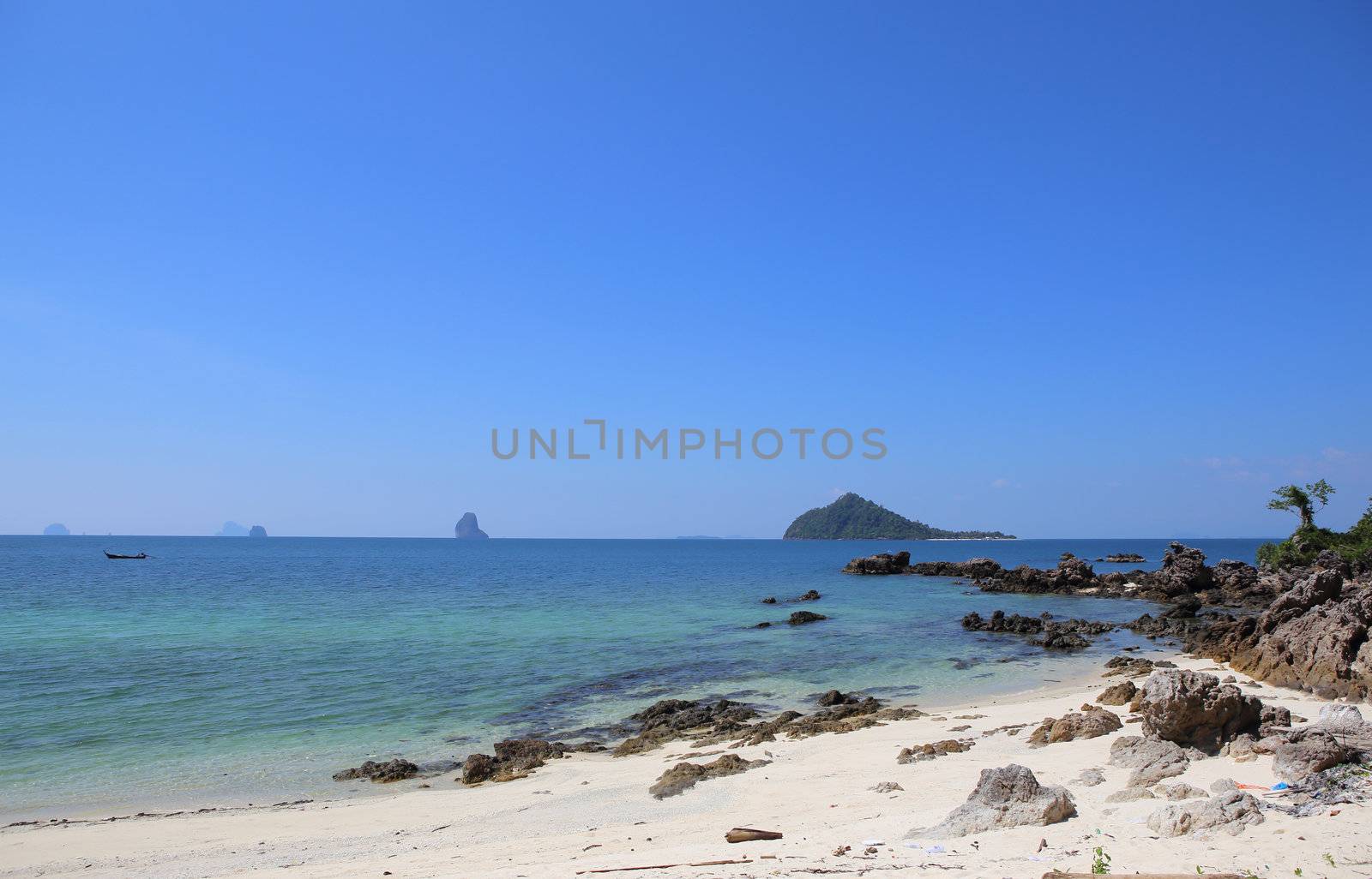 beach with rocks and blue sky,Thailand