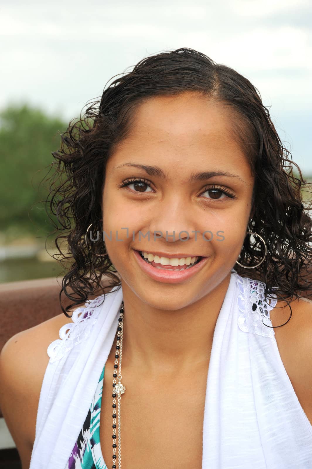 African American female beauty posing outside.