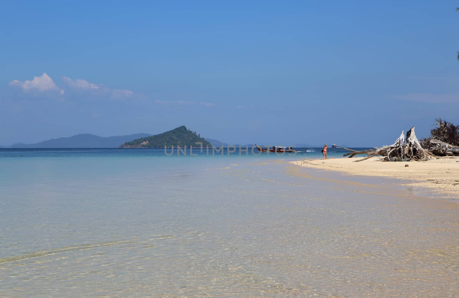 Beautiful white sand beach on island with crystal clear sea, Andaman sea, Thailand