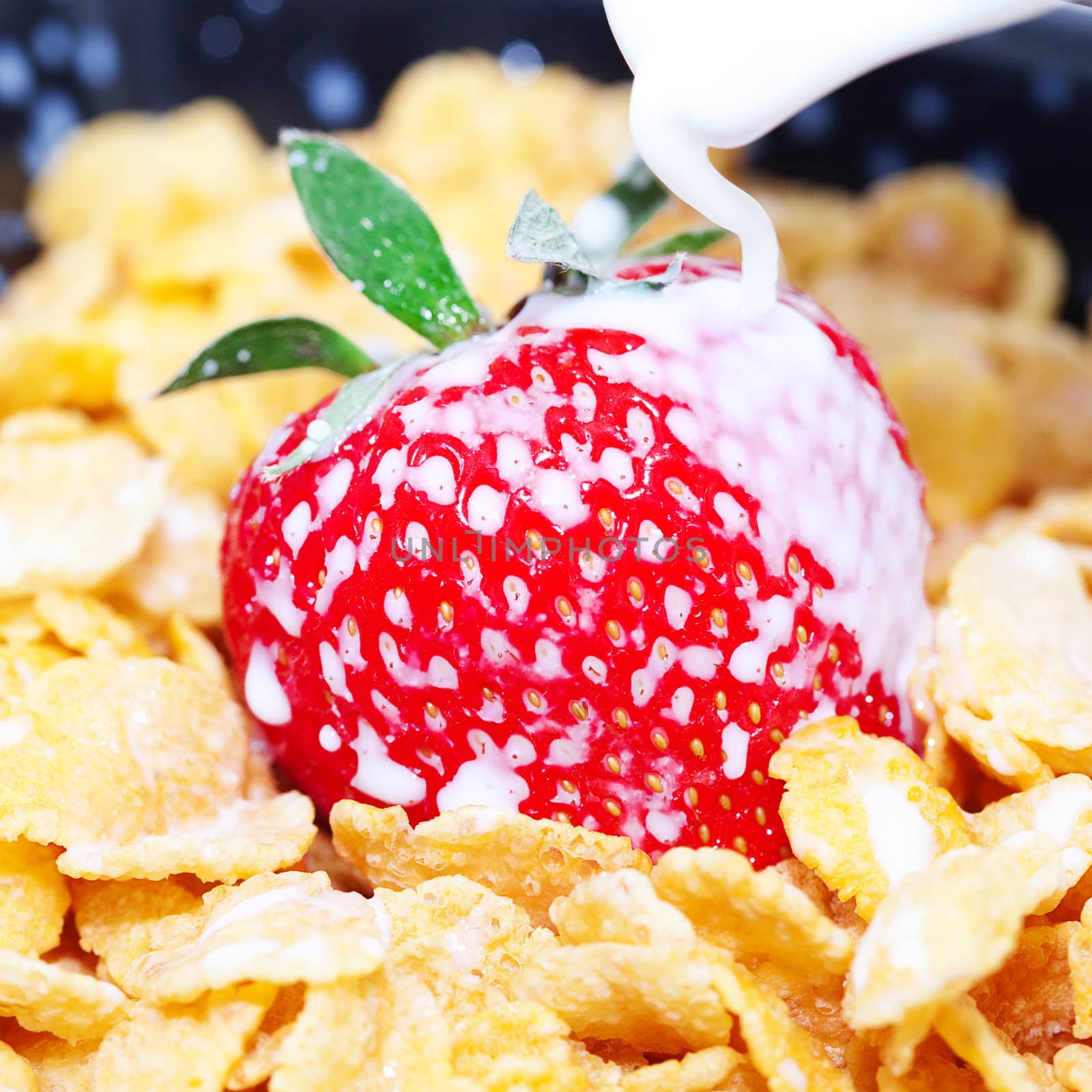 strawberry,milk and flakes in a bowl by jannyjus