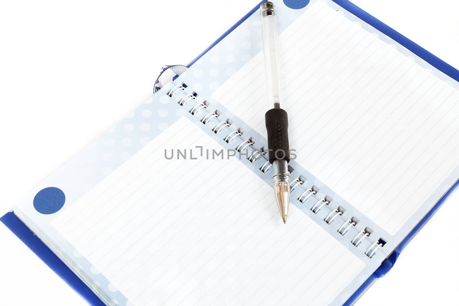 Close-up of empty notes with black pen on white background