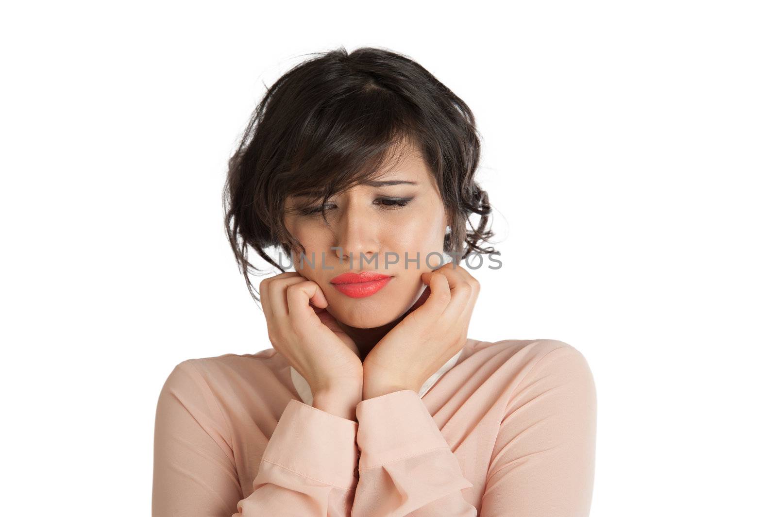 Portrait of a woman in a pink blouse on a white background isolated