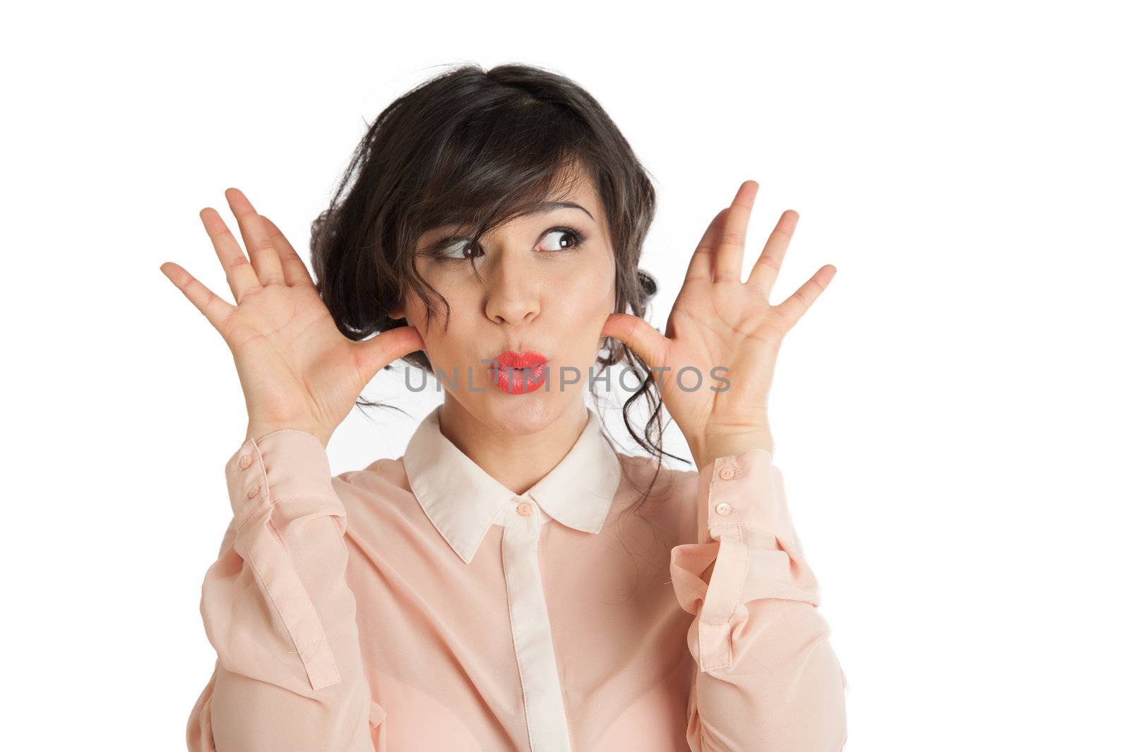 Portrait of a woman in a pink blouse on a white background isolated