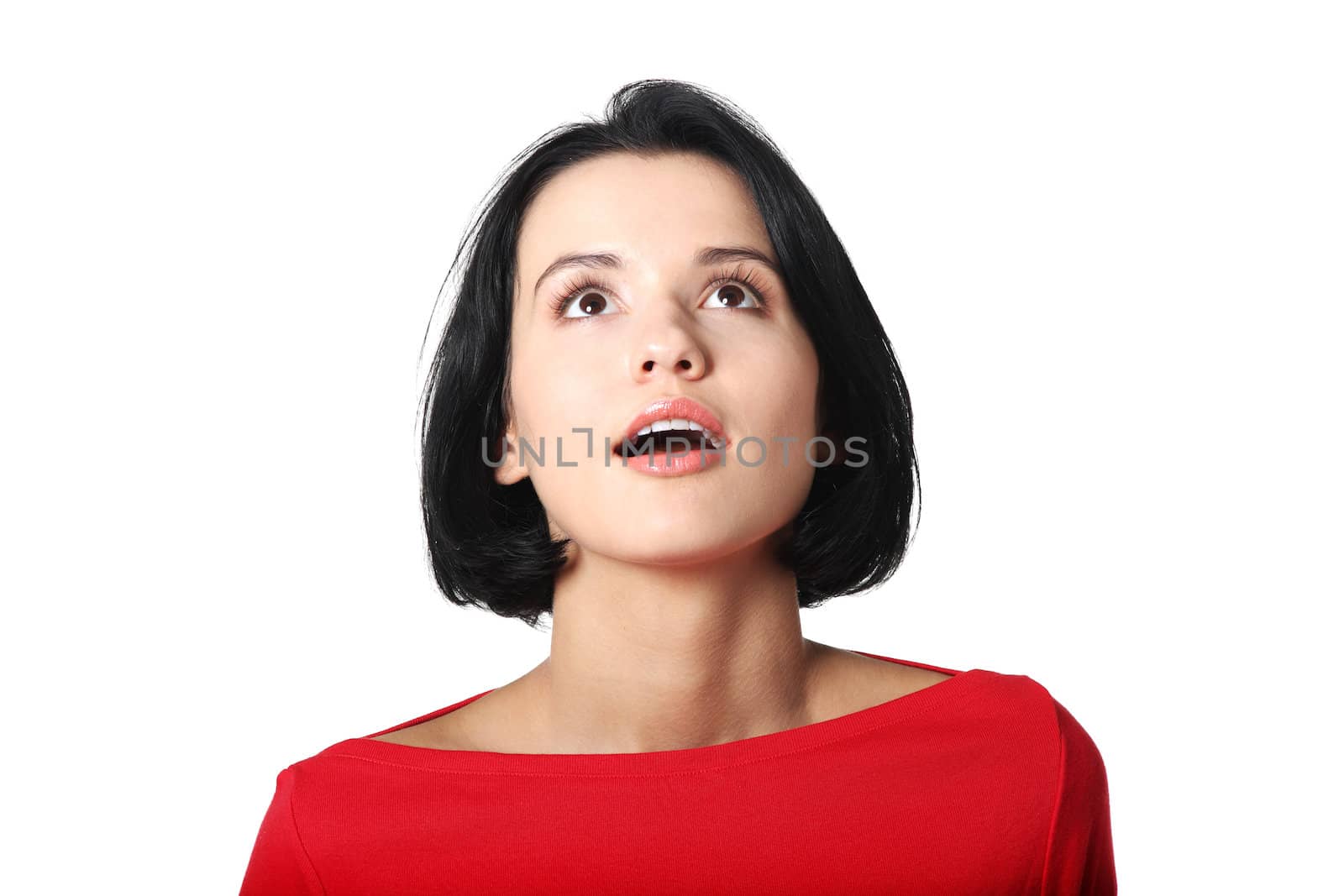 Attractive woman looking up. Isolated on white.