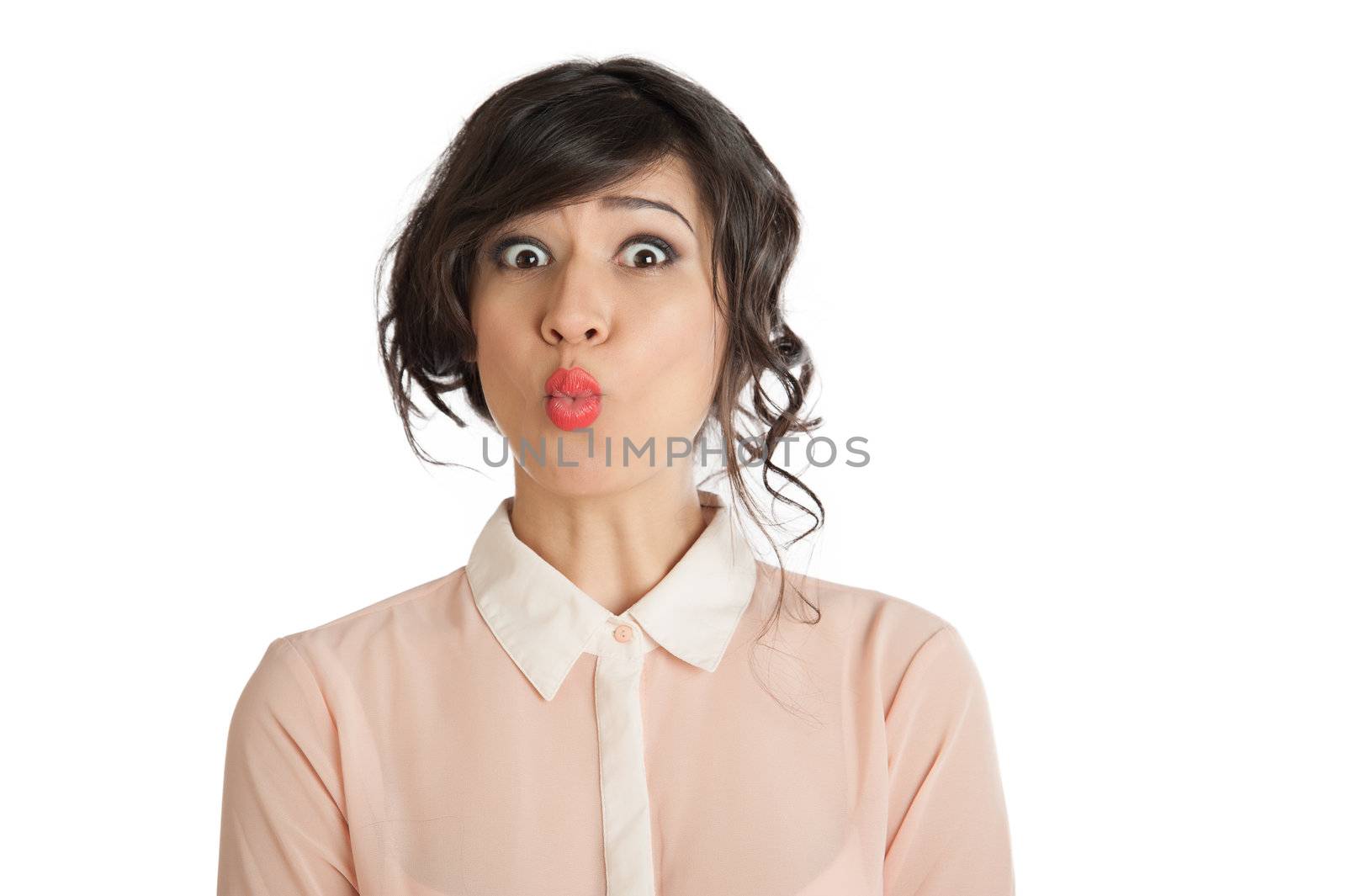 Portrait of a woman in a pink blouse on a white background isolated