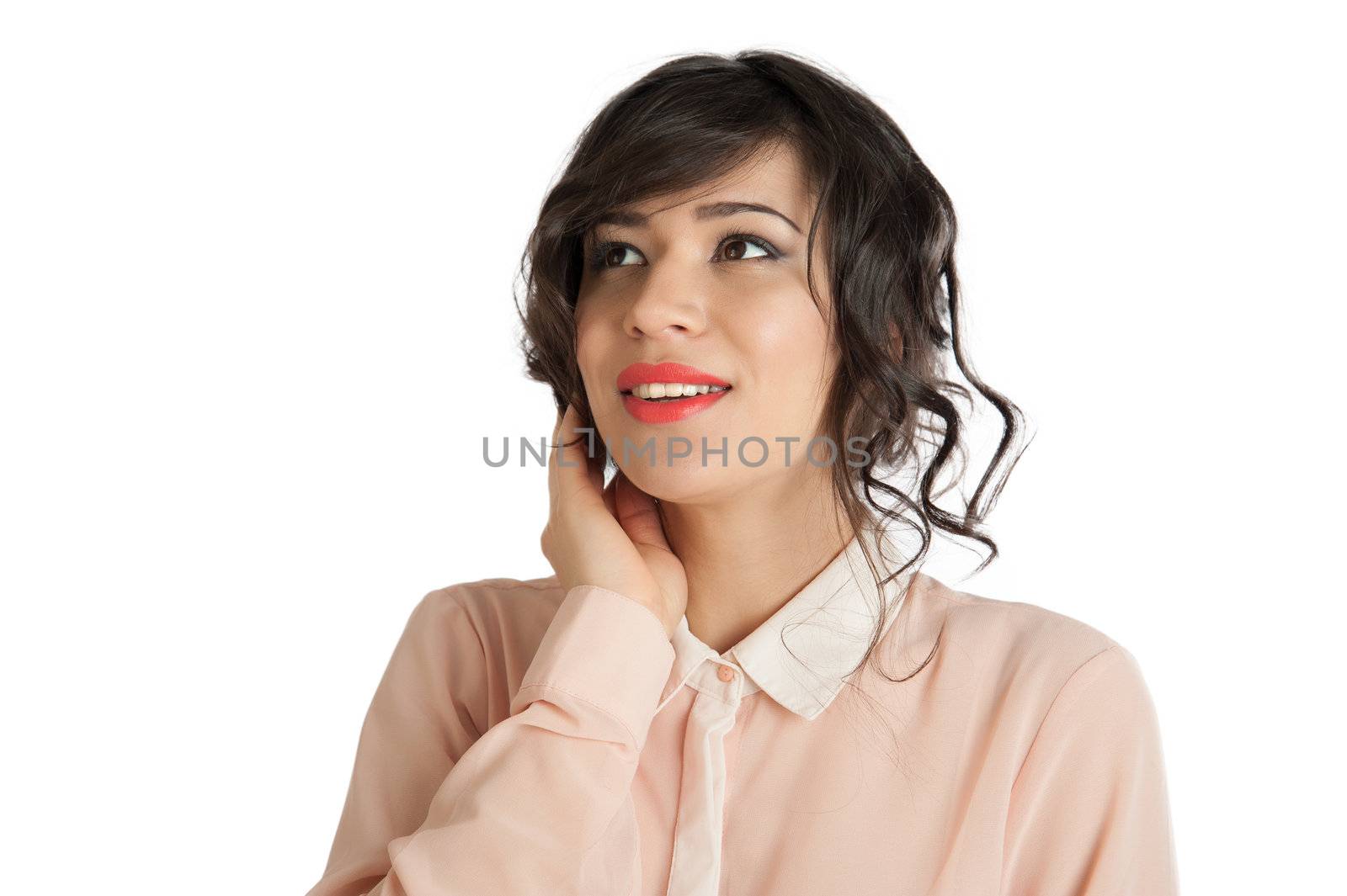 Portrait of a woman in a pink blouse on a white background isolated