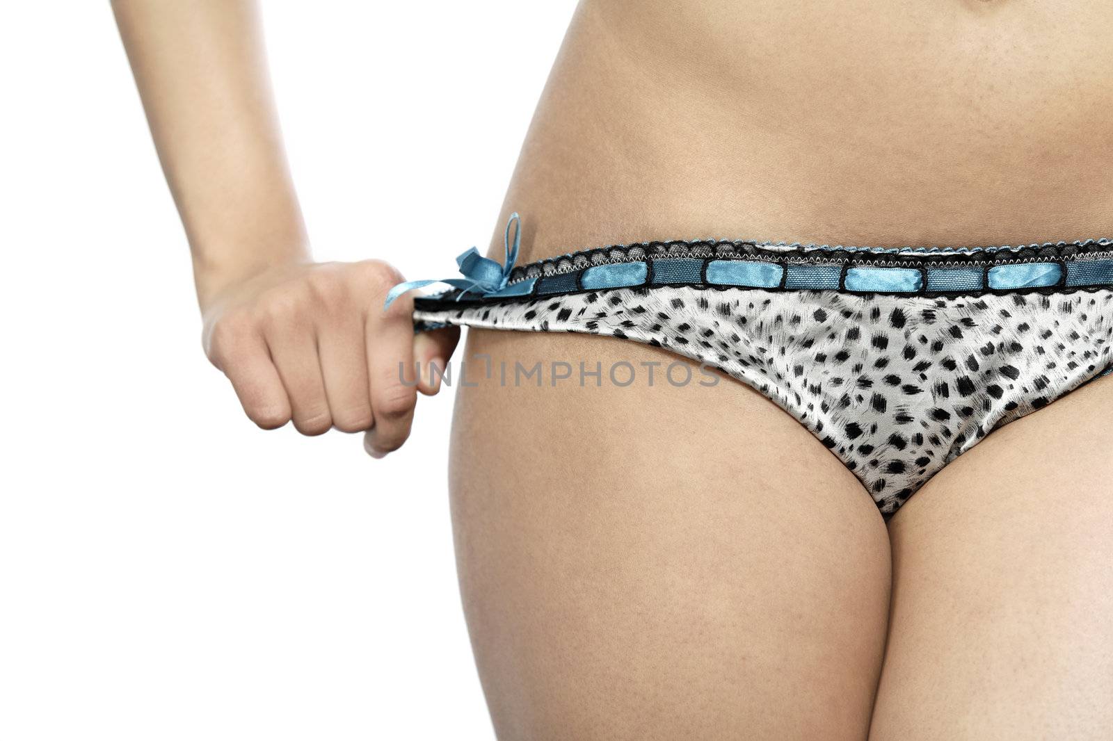 Close up of woman's waist in underwear and hand holding side band