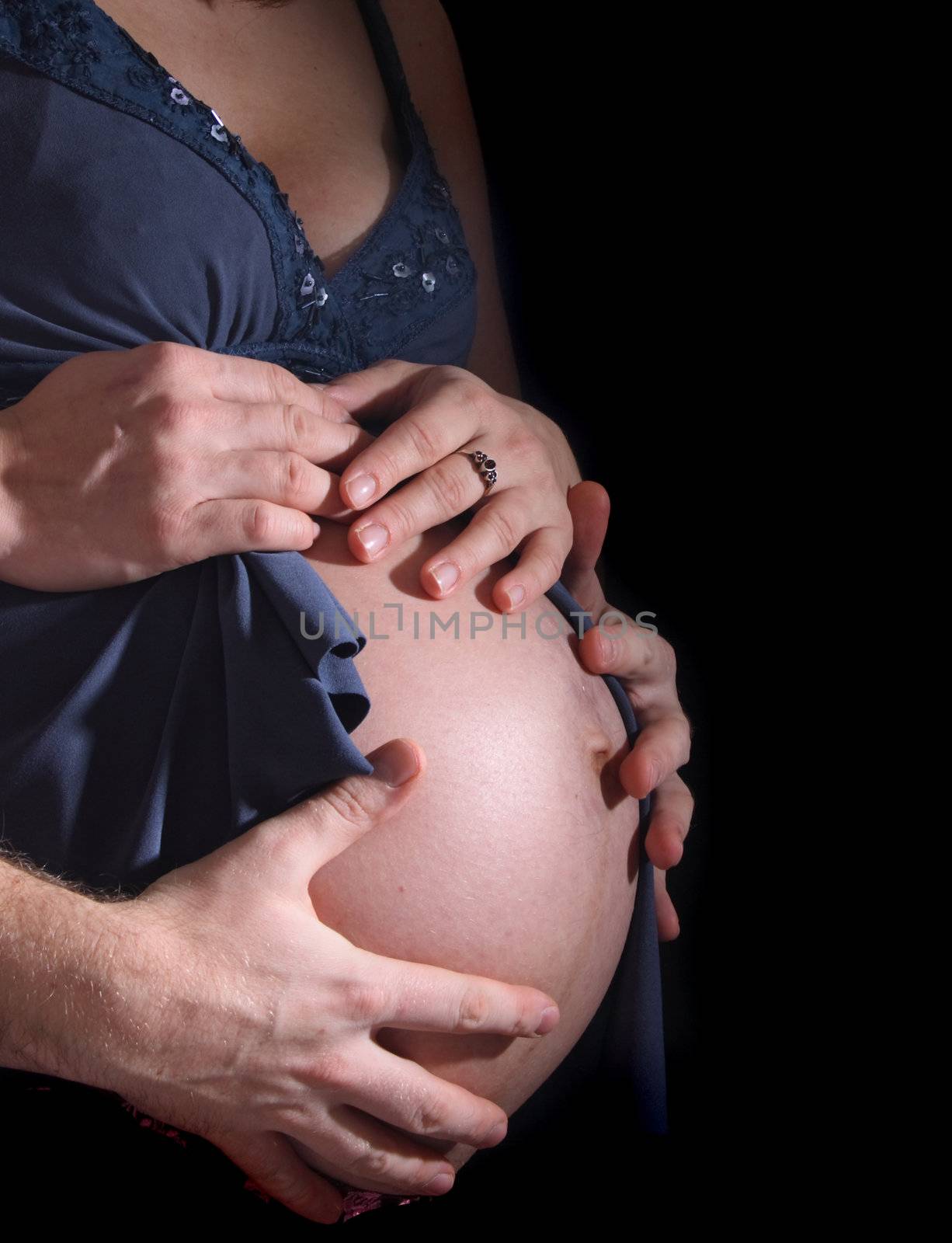 detail of the young mother on the black background