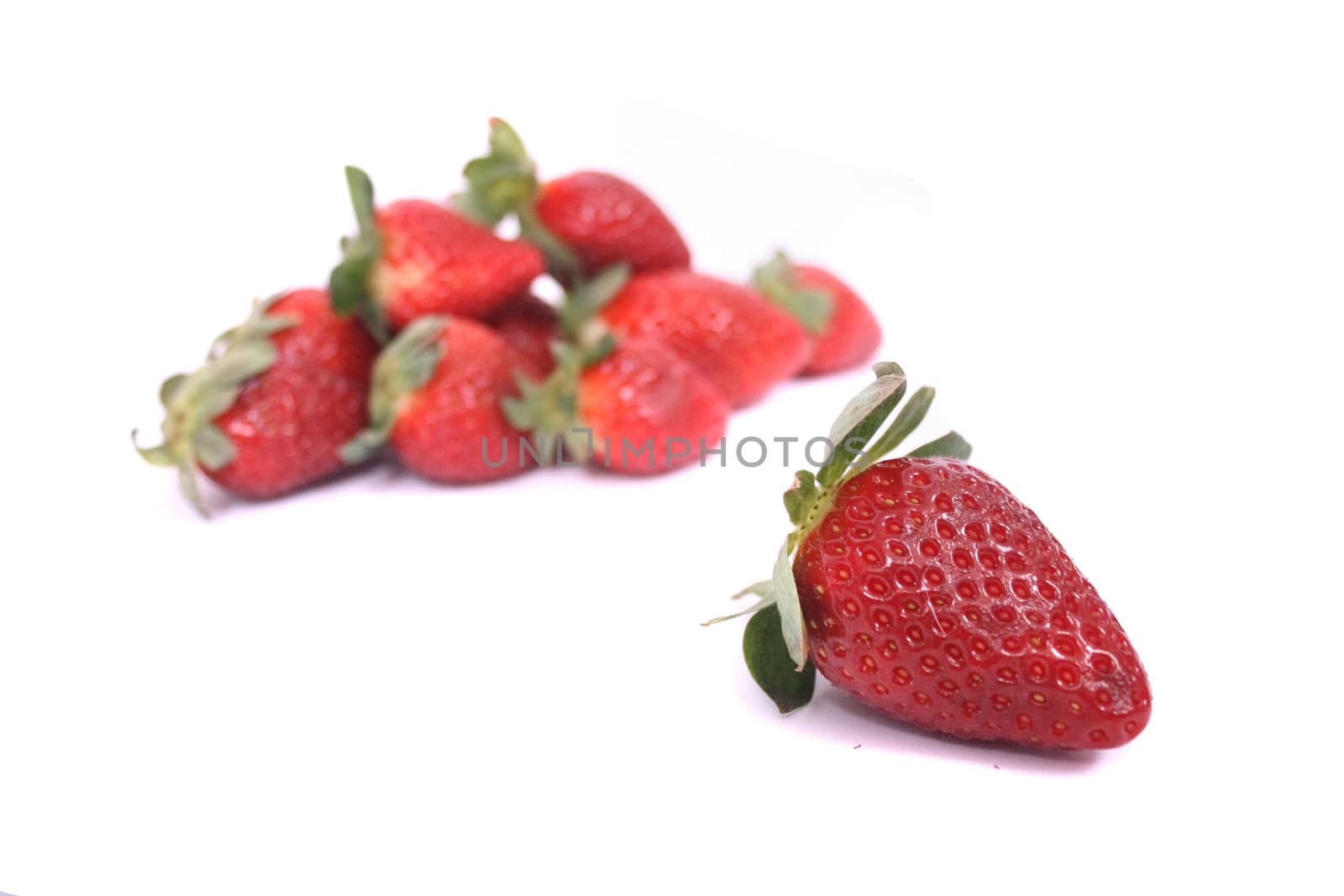 fresh red strawberries on the white background