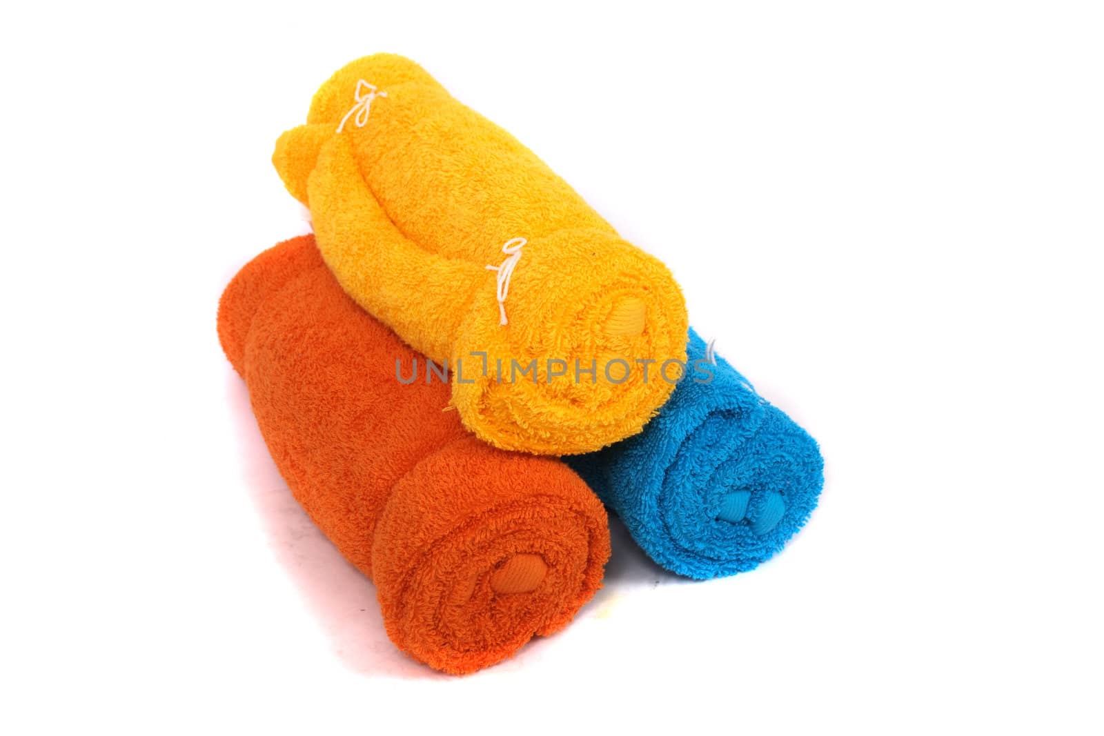 yellow, red and yellow towels on the white background