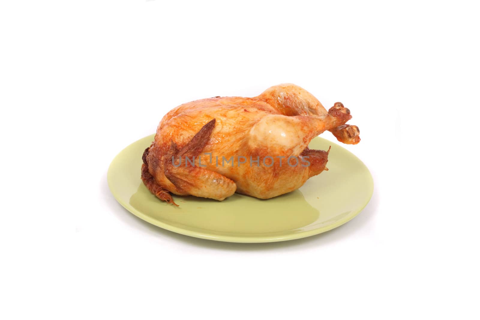 chicken on the green plate on the white background