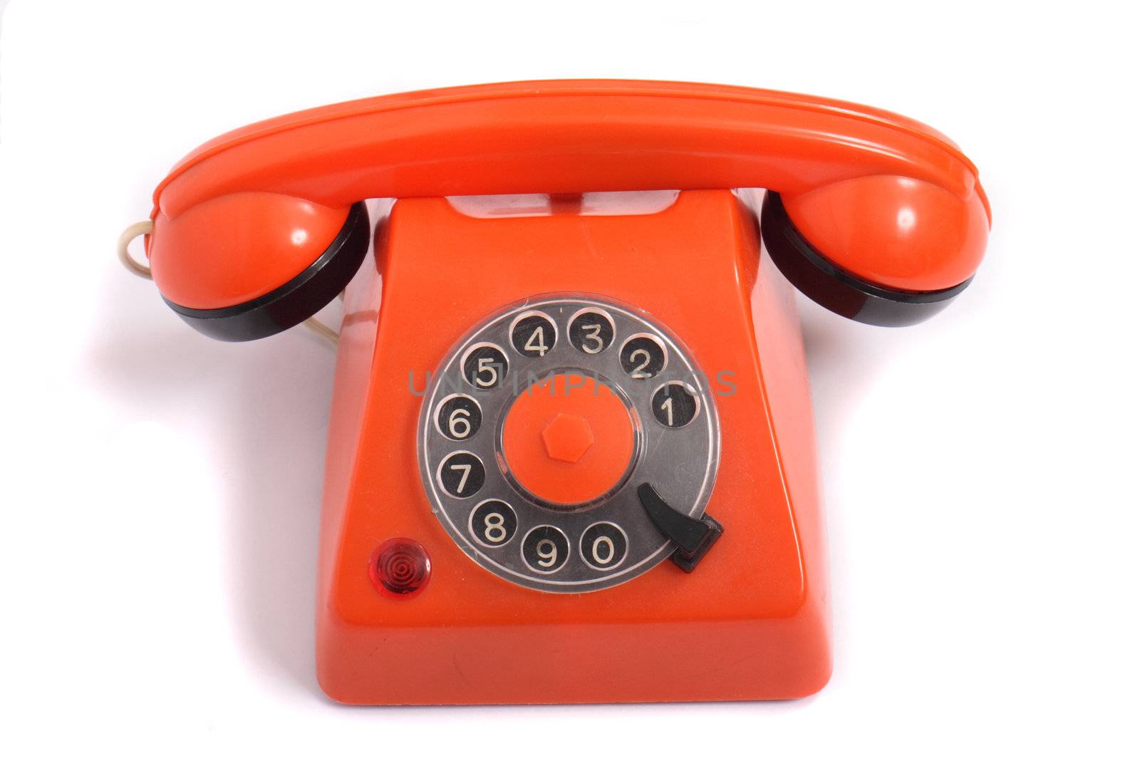 old orange phone on the white background